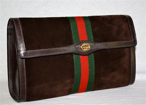 vintage gucci brown suede clutch|gucci vintage suede clutch.